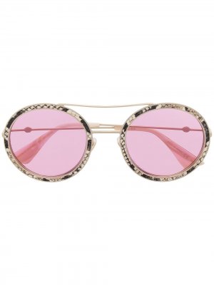Солнцезащитные очки в круглой оправе Gucci Eyewear. Цвет: золотистый