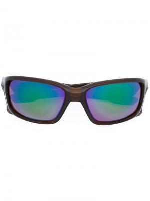 Солнцезащитные очки в квадратной оправе Oakley. Цвет: коричневый