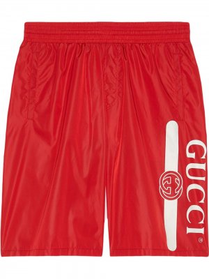 Плавки-шорты с логотипом Gucci. Цвет: красный