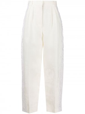 Зауженные брюки с кружевными вставками Alexander McQueen. Цвет: белый