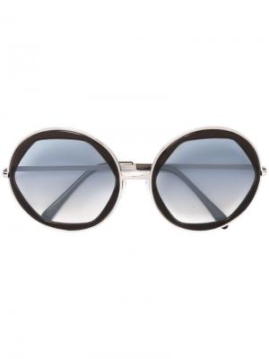 Солнцезащитные очки в круглой оправе Emilio Pucci. Цвет: чёрный